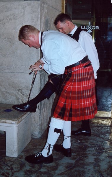 014.'Damn these laces, Man . . . couldn't you have worn loafers'.JPG