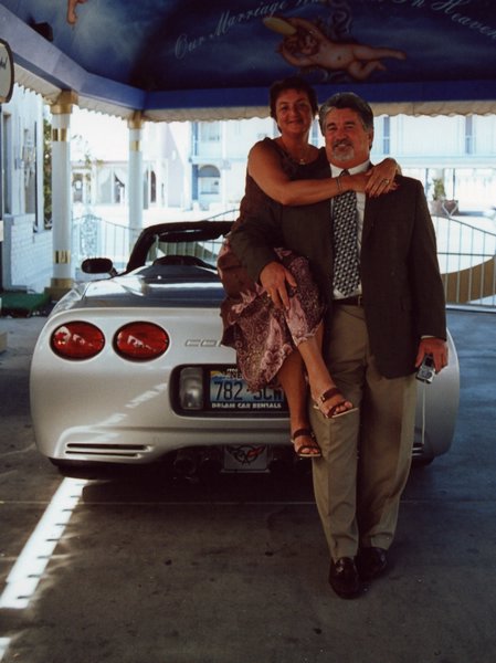 056.Lisa and Kim posing with the C5 Wedding Wagon.JPG