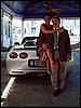 056.Lisa and Kim posing with the C5 Wedding Wagon.JPG