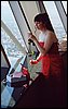 079.Reflecting on the days events, Tracy contemplates a wedding rose.JPG