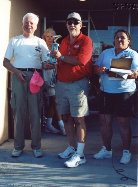 049.Bubba accepts his C5 trophy from Dave.JPG