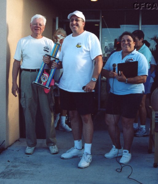 052.John accepts his and Kathy's C4 trophy from Dave.JPG