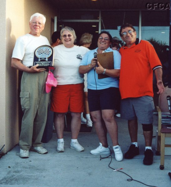 059.Tony and Marie honor the McLellans for their continued support of the 'Corvettes in Paradise' show.JPG
